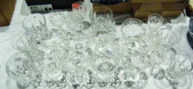 Set of eight cut glass champagnes and various other cut glass tumblers etc.