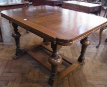 Twentieth century oak drawleaf dining table, on turned bulbous supports, united by double stretcher,