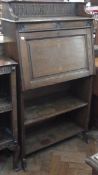 Early twentieth century oak bureau with top shelf and galleried surround, fitted interior with two