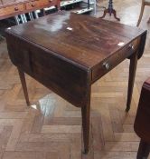 An Edwardian mahogany dropleaf D-end table on square tapering supports, brass cups and castors