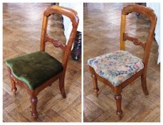 Set of four twentieth century Victorian style chairs, with overstuffed seat covers, carved