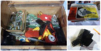 Quantity Meccano tinplate construction items, to include:- books of model outfits, in a wooden case