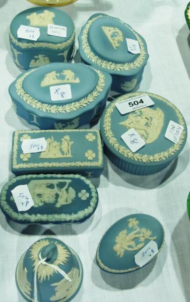 A collection of eight various Wedgwood jasperware items to include:- bell and covered trinket pots