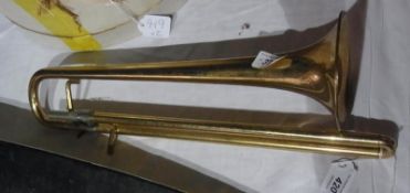 An old brass trumpet, minus mouthpiece