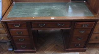 Edwardian mahogany pedestal desk, with inset writing surface, three frieze drawers, with three