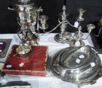 A silverplate oval entree dish and cover, a circular tray with piecrust border, oval dish and two
