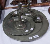 Pair pewter candlesticks, two pewter plates, charger, milk jug and an inkwell (5)