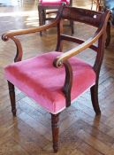 Pair of late nineteenth century mahogany elbow chairs, upholstered in pink velvet, on turned front