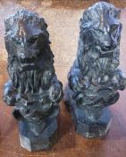 A pair nineteenth century cast iron lions rampant with shield on box base