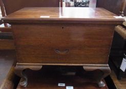 A mahogany sewing box with hinged top enclosing fitted interior, with drawer below, on short