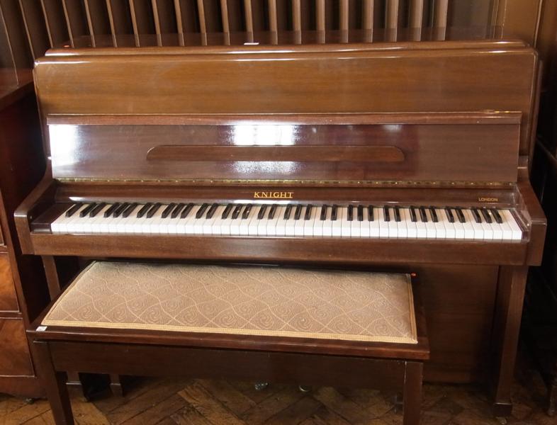 A Knight iron framed and overstrung pianoforte, No 2851, mahogany case, 136cm wide together with a