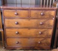 A Victorian mahogany chest of two short and three long graduated drawers, raised on castors, 106cm