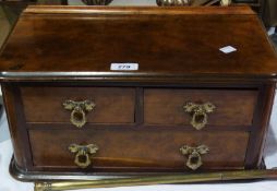 Victorian burr walnutwood miniature chest of two short and one long drawers, the top with ogee mould