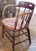 Set of three hardwood back spindleback elbow chairs