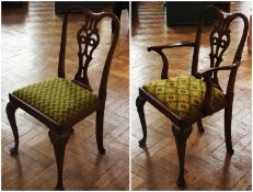 A set of eight revived Georgian style reproduction mahogany pierced back dining chairs, with drop-in