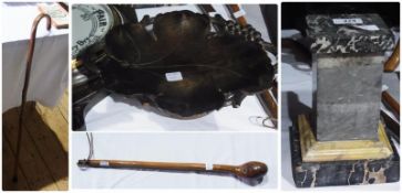 A carved wood leaf-shaped bowl with music box, an African Keri club, old walking stick and a