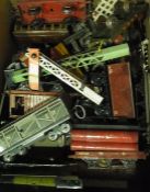 A collection of Hornby 'O' gauge tinplate railway wagons, tank engine, signals, etc