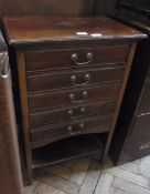 Edwardian mahogany music chest, the five drawers with fall fronts and open shelf below on square