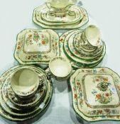 A Spode "Chinese Rose" part dinner service comprising:- pair tureens and covers, graduated meat