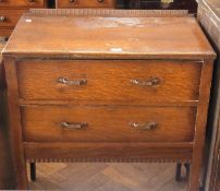 Twentieth century oak chest of two long drawers, on square legs, width 76cms