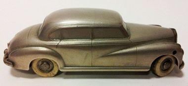 A circa 1947 Prameta diecast clockwork model of a Mercedes Benz 300, with gears and steering etc,