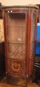 Louis XV style reproduction mahogany and gilt metal china display cabinet, of serpentine shape,
