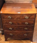 A reproduction mahogany bowfront chest of four long graduated drawers on splayed bracket feet, width