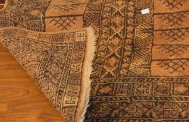 Oriental design wool rug with brown field and overall floral pattern, within multiple borders, 3'