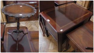 A reproduction mahogany coffee table with canted corners, frieze drawer on moulded square legs,