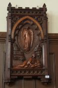 A Victorian oak Gothic revival carved religious panel, with text and guardian angel with figure,