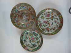 A Chinese canton porcelain shallow dish, with typical decoration of birds, butterflies and