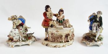 Pair of Dresden figures seated and playing with pet animals, together with a Capodimonte figure