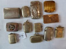 Various silverplate and metal vestas, one marked "Monte Carlo Restaurant, 1-2 Leicester Street,