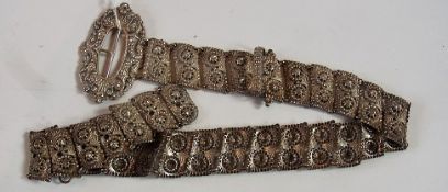 Silver-coloured metal embossed belt, all faceted star and foliate scroll decorated