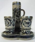 Late Victorian EPNS mounted stoneware lemonade set, the trefoil tray having a stork, frogs and