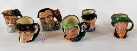 A collection of small character jugs, including:- Royal Doulton "Sairey Gamp", "Merlin", "Robinson