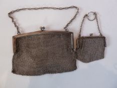 A .925 silver chain mail evening bag together with a similar purse