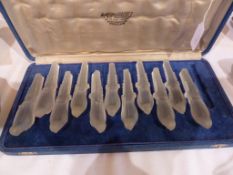 Art Deco Bijouteries Caubet, Delon, France, eleven glass knife rests, in the shape of a parakeet, in