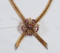 Gold, ruby and diamond necklace, the herringbone chain with ruby and diamond set flowerhead to the