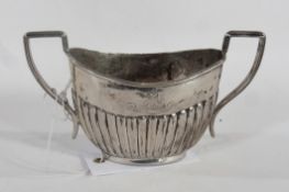 Edwardian silver two-handled oval sugar basin, of reeded form, maker Alexander Clark, London,