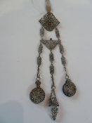 A filigree white metal chatelaine, the suspension chain inset with turquoise, attaching a scent