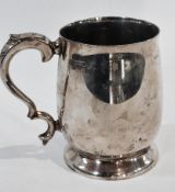 Elizabeth II silver pint mug, of plain form with scroll handle and circular foot, Sheffield 1966,