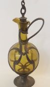 Art Nouveau pewter mounted claret jug, green glass, 34cm high