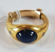22ct gold and cabochon star sapphire ring