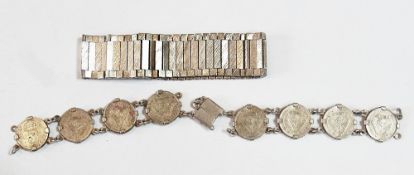 Silver flat segmented bracelet, with rib decoration, and a coin bracelet