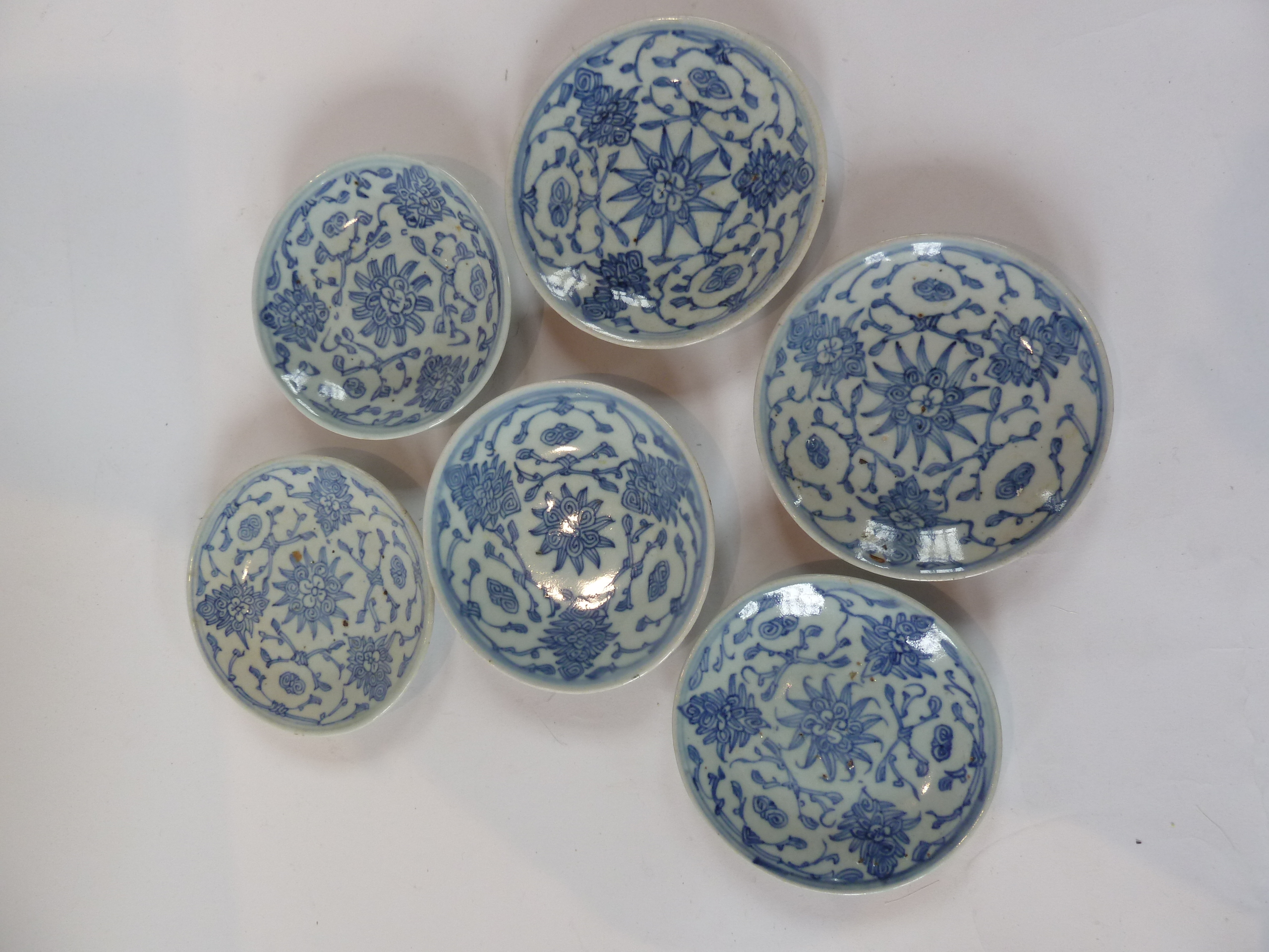 Set of six Chinese Ching dynasty plates, with underglaze blue lotus blossom decoration, 15cm