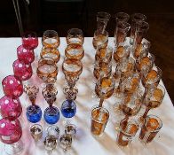 Large quantity of yellow flash glass to include:- wines, champagnes and other glass together with