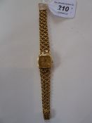 Lady's Omega De Ville 18ct gold wristwatch, the square gold coloured metal face on 18ct triple row