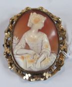 Nineteenth century carved shell cameo brooch, half-length portrait of a lady, seated and having