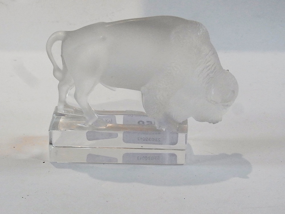 Lalique Bison  on stand, etched to base, approximately 9.5cm high